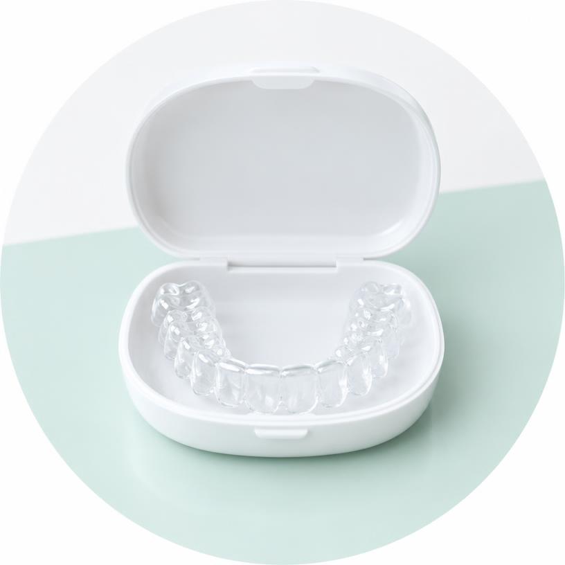 Illustrative whitening tray and case, not the specific campaign kit